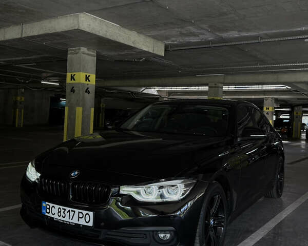 Черный БМВ 3 Серия, объемом двигателя 2 л и пробегом 98 тыс. км за 19900 $, фото 1 на Automoto.ua