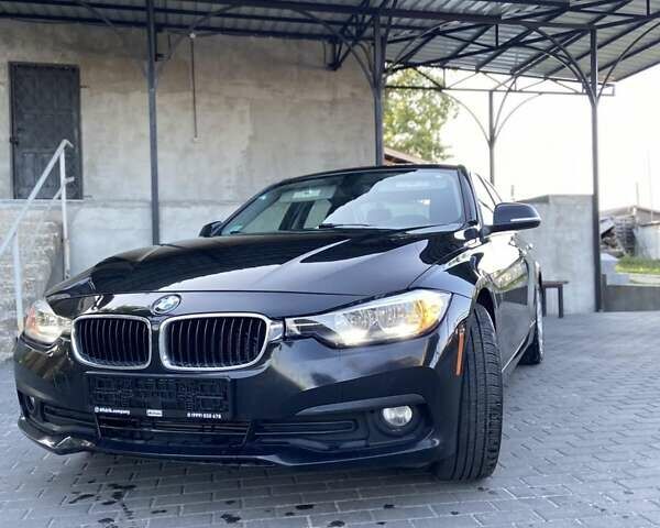 Черный БМВ 3 Серия, объемом двигателя 2 л и пробегом 197 тыс. км за 12800 $, фото 1 на Automoto.ua