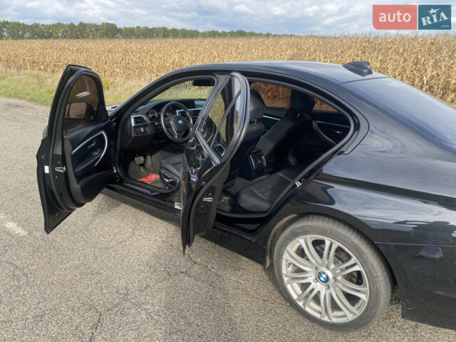 Чорний БМВ 3 Серія, об'ємом двигуна 2 л та пробігом 180 тис. км за 15190 $, фото 1 на Automoto.ua