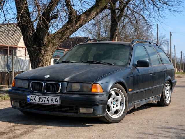 Чорний БМВ 3 Серія, об'ємом двигуна 1.7 л та пробігом 456 тис. км за 700 $, фото 1 на Automoto.ua