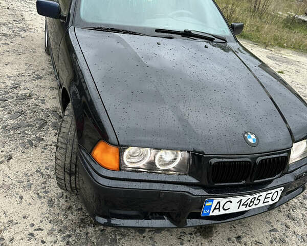 Черный БМВ 3 Серия, объемом двигателя 1.8 л и пробегом 545 тыс. км за 1900 $, фото 1 на Automoto.ua