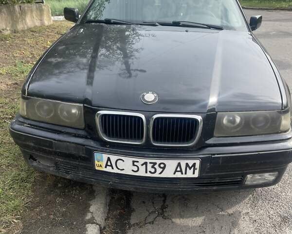 Черный БМВ 3 Серия, объемом двигателя 1.6 л и пробегом 280 тыс. км за 3500 $, фото 1 на Automoto.ua