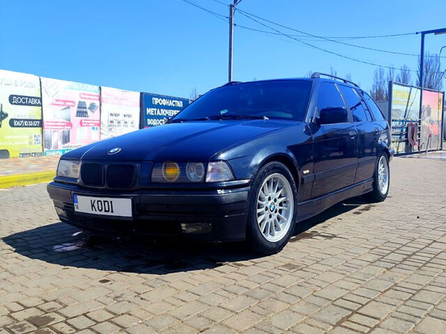 Черный БМВ 3 Серия, объемом двигателя 1.8 л и пробегом 370 тыс. км за 3500 $, фото 1 на Automoto.ua