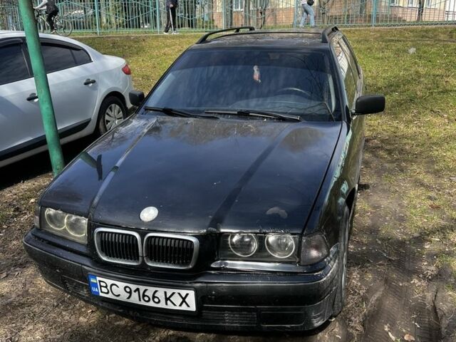 Черный БМВ 3 Серия, объемом двигателя 1.6 л и пробегом 466 тыс. км за 1500 $, фото 1 на Automoto.ua