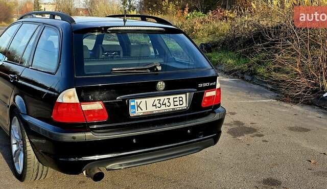 Черный БМВ 3 Серия, объемом двигателя 2.99 л и пробегом 275 тыс. км за 9470 $, фото 1 на Automoto.ua