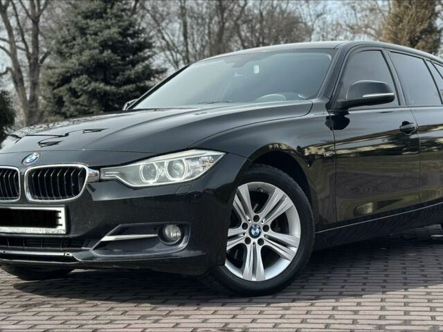 Черный БМВ 3 Серия, объемом двигателя 2 л и пробегом 335 тыс. км за 10999 $, фото 1 на Automoto.ua