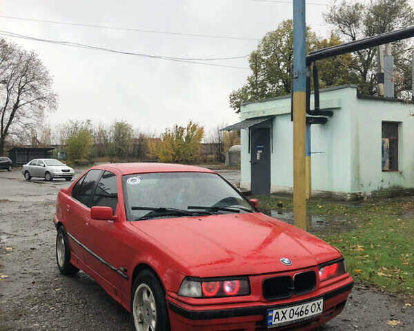 Красный БМВ 3 Серия, объемом двигателя 1.6 л и пробегом 777 тыс. км за 1900 $, фото 1 на Automoto.ua