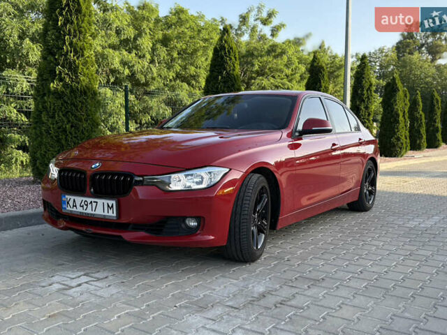 Красный БМВ 3 Серия, объемом двигателя 2 л и пробегом 174 тыс. км за 12700 $, фото 1 на Automoto.ua