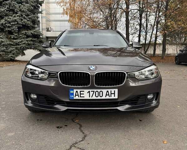 Серый БМВ 3 Серия, объемом двигателя 2 л и пробегом 203 тыс. км за 12000 $, фото 1 на Automoto.ua