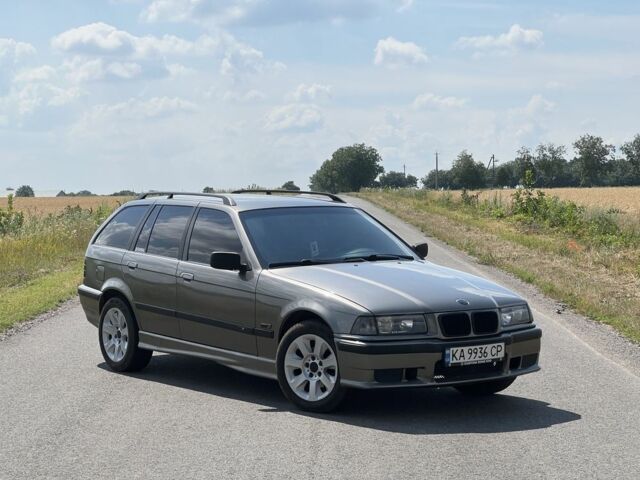 Серый БМВ 3 Серия, объемом двигателя 2.5 л и пробегом 365 тыс. км за 4000 $, фото 1 на Automoto.ua