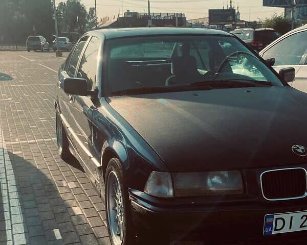 Синий БМВ 3 Серия, объемом двигателя 1.8 л и пробегом 505 тыс. км за 2600 $, фото 1 на Automoto.ua