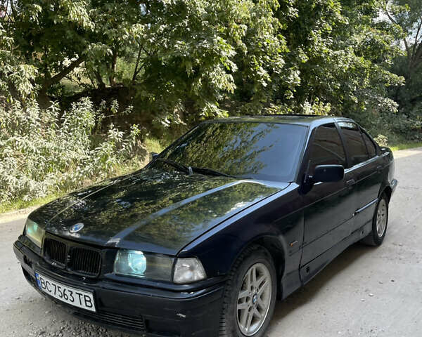 Синий БМВ 3 Серия, объемом двигателя 1.6 л и пробегом 250 тыс. км за 1950 $, фото 1 на Automoto.ua