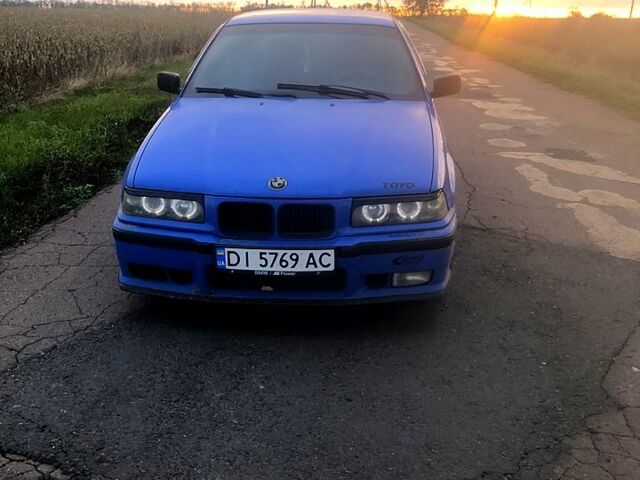 Синій БМВ 3 Серія, об'ємом двигуна 1.8 л та пробігом 400 тис. км за 2868 $, фото 1 на Automoto.ua