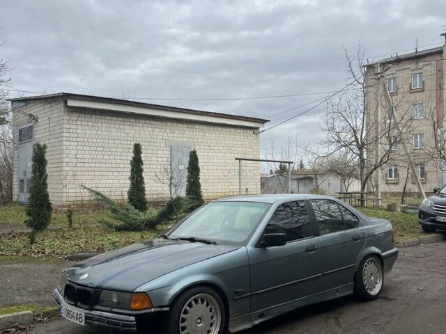 Синий БМВ 3 Серия, объемом двигателя 1.8 л и пробегом 410 тыс. км за 2100 $, фото 1 на Automoto.ua