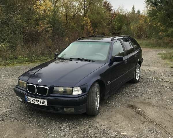 Синий БМВ 3 Серия, объемом двигателя 1.8 л и пробегом 380 тыс. км за 4000 $, фото 1 на Automoto.ua