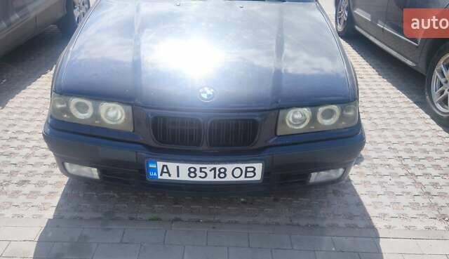 Синий БМВ 3 Серия, объемом двигателя 2.5 л и пробегом 430 тыс. км за 3900 $, фото 1 на Automoto.ua