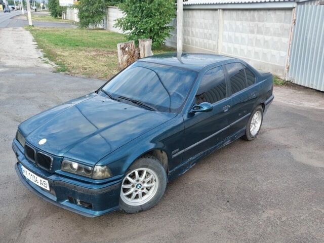 Зеленый БМВ 3 Серия, объемом двигателя 2.5 л и пробегом 300 тыс. км за 2000 $, фото 1 на Automoto.ua