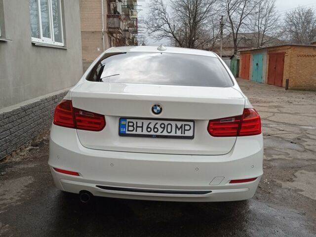 Белый БМВ 318, объемом двигателя 2 л и пробегом 235 тыс. км за 14000 $, фото 1 на Automoto.ua