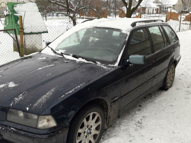 Синій БМВ 318, об'ємом двигуна 1.7 л та пробігом 254 тис. км за 4800 $, фото 1 на Automoto.ua