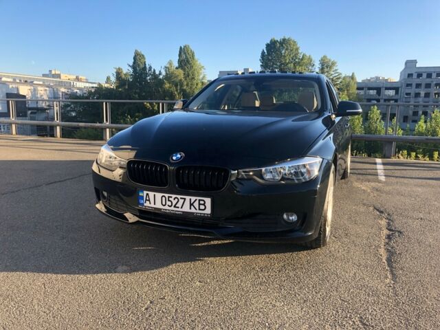 Чорний БМВ 320, об'ємом двигуна 2 л та пробігом 129 тис. км за 13300 $, фото 1 на Automoto.ua