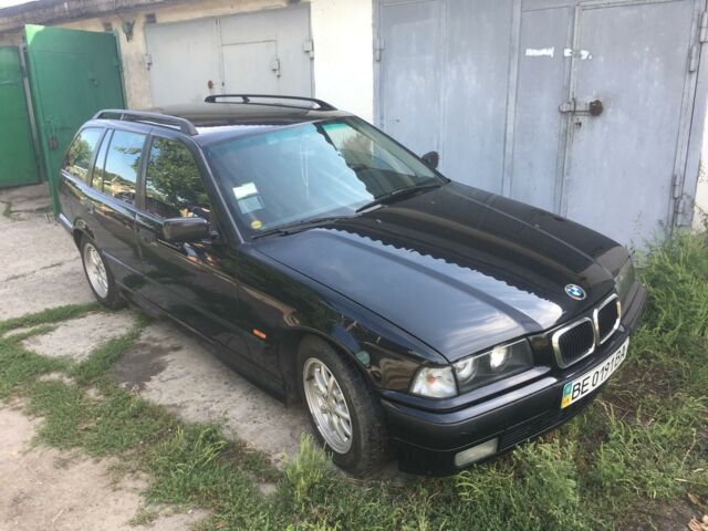 Черный БМВ 320, объемом двигателя 2 л и пробегом 160 тыс. км за 4100 $, фото 1 на Automoto.ua