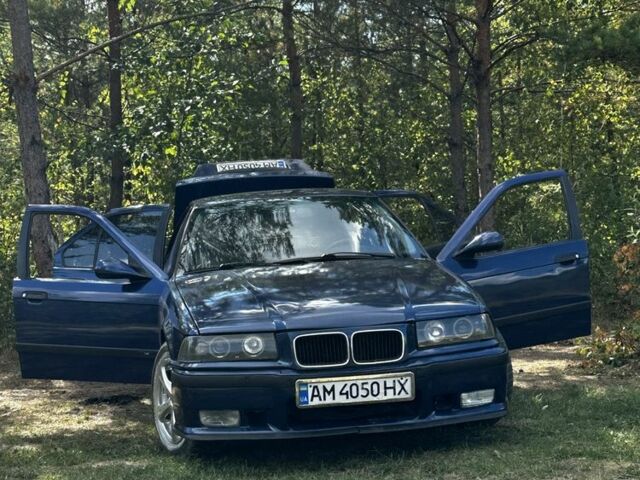 Синий БМВ 320, объемом двигателя 2 л и пробегом 280 тыс. км за 3505 $, фото 1 на Automoto.ua