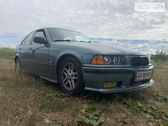 Зелений БМВ 320, об'ємом двигуна 2 л та пробігом 405 тис. км за 4100 $, фото 1 на Automoto.ua