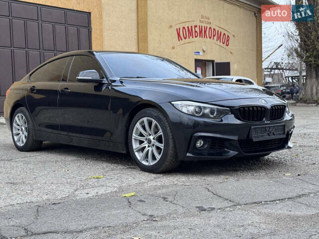 Черный БМВ 4 Серия, объемом двигателя 2 л и пробегом 160 тыс. км за 19999 $, фото 1 на Automoto.ua