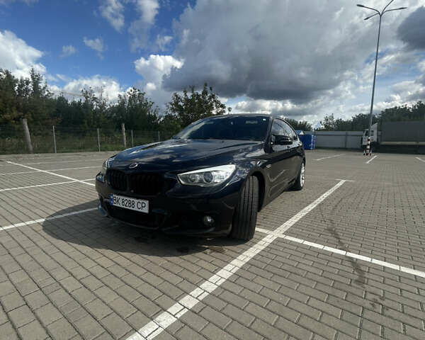 Черный БМВ 5 Серия ГТ, объемом двигателя 3 л и пробегом 188 тыс. км за 18999 $, фото 1 на Automoto.ua