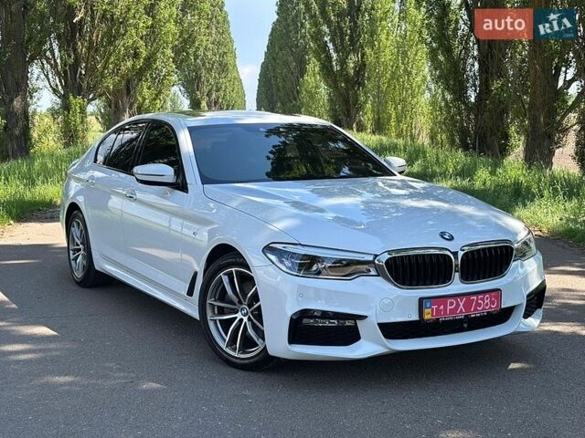 Белый БМВ 5 Серия, объемом двигателя 2 л и пробегом 156 тыс. км за 28200 $, фото 1 на Automoto.ua