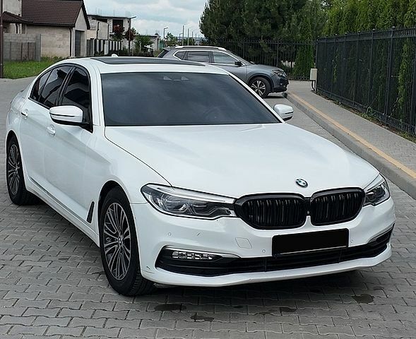 Белый БМВ 5 Серия, объемом двигателя 2 л и пробегом 180 тыс. км за 21800 $, фото 1 на Automoto.ua