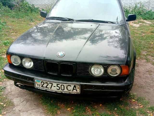 Черный БМВ 5 Серия, объемом двигателя 2.5 л и пробегом 397 тыс. км за 1890 $, фото 1 на Automoto.ua