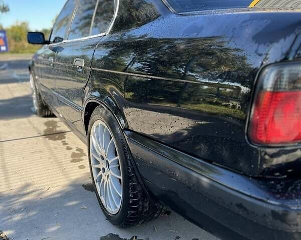Черный БМВ 5 Серия, объемом двигателя 2.5 л и пробегом 430 тыс. км за 3500 $, фото 1 на Automoto.ua