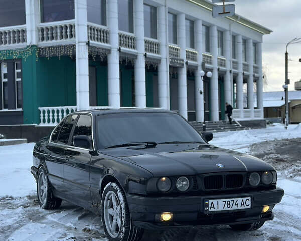 Черный БМВ 5 Серия, объемом двигателя 2.5 л и пробегом 261 тыс. км за 3700 $, фото 1 на Automoto.ua