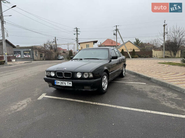 Черный БМВ 5 Серия, объемом двигателя 2.5 л и пробегом 310 тыс. км за 2299 $, фото 1 на Automoto.ua