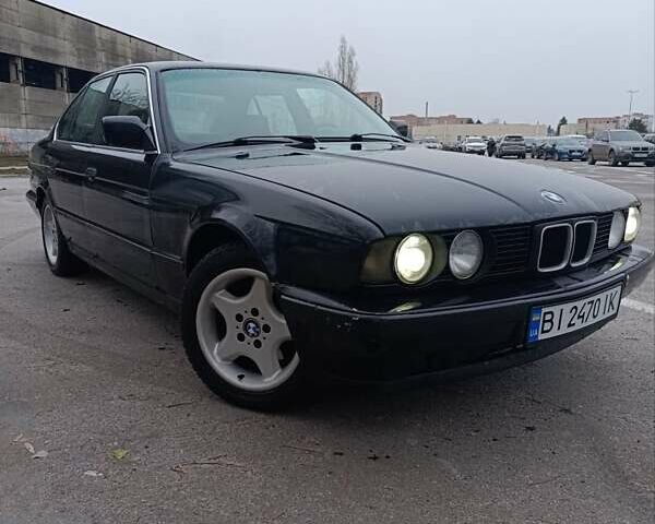 Черный БМВ 5 Серия, объемом двигателя 2 л и пробегом 500 тыс. км за 3300 $, фото 1 на Automoto.ua