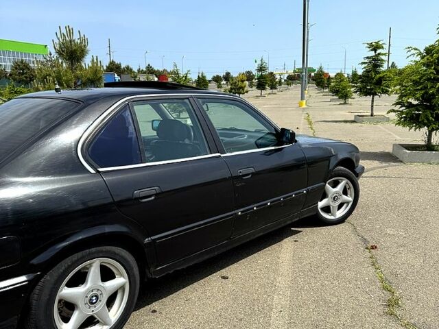 Черный БМВ 5 Серия, объемом двигателя 2.5 л и пробегом 455 тыс. км за 2400 $, фото 1 на Automoto.ua