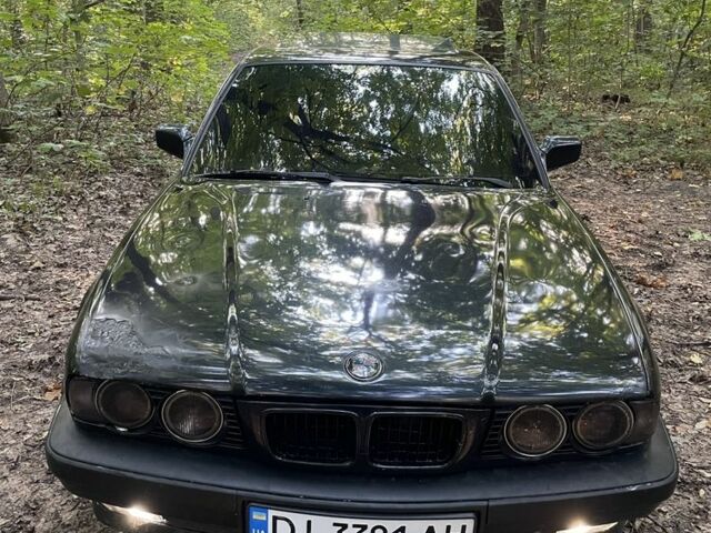 Черный БМВ 5 Серия, объемом двигателя 2 л и пробегом 480 тыс. км за 1556 $, фото 1 на Automoto.ua