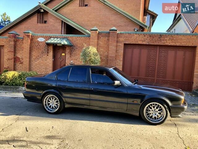 Черный БМВ 5 Серия, объемом двигателя 4 л и пробегом 350 тыс. км за 8900 $, фото 1 на Automoto.ua