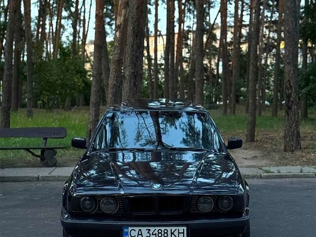 Черный БМВ 5 Серия, объемом двигателя 2.5 л и пробегом 415 тыс. км за 2300 $, фото 1 на Automoto.ua