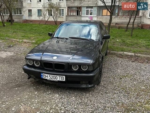 Черный БМВ 5 Серия, объемом двигателя 2 л и пробегом 475 тыс. км за 3500 $, фото 1 на Automoto.ua