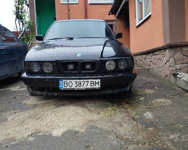 Черный БМВ 5 Серия, объемом двигателя 2.5 л и пробегом 403 тыс. км за 2002 $, фото 1 на Automoto.ua