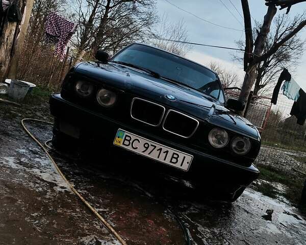 Черный БМВ 5 Серия, объемом двигателя 2.5 л и пробегом 300 тыс. км за 1500 $, фото 1 на Automoto.ua