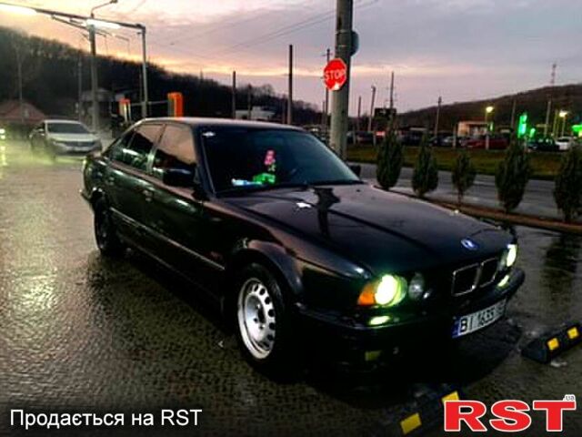 Черный БМВ 5 Серия, объемом двигателя 2.5 л и пробегом 300 тыс. км за 1950 $, фото 1 на Automoto.ua