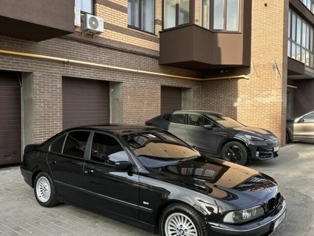 Черный БМВ 5 Серия, объемом двигателя 2.5 л и пробегом 300 тыс. км за 4999 $, фото 1 на Automoto.ua