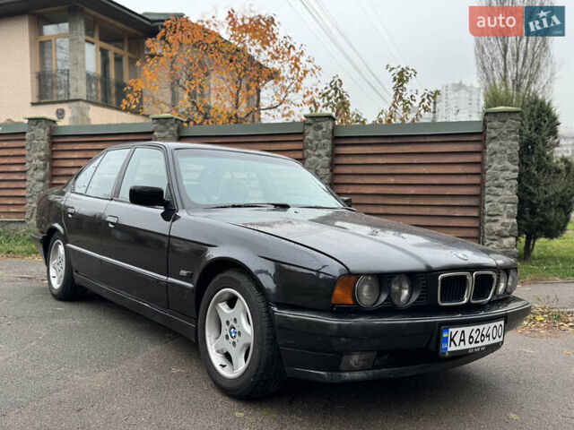 Черный БМВ 5 Серия, объемом двигателя 2.5 л и пробегом 471 тыс. км за 3500 $, фото 1 на Automoto.ua