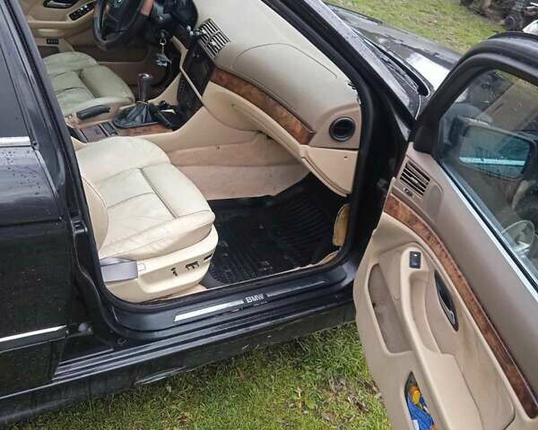 Черный БМВ 5 Серия, объемом двигателя 2 л и пробегом 222 тыс. км за 2800 $, фото 1 на Automoto.ua