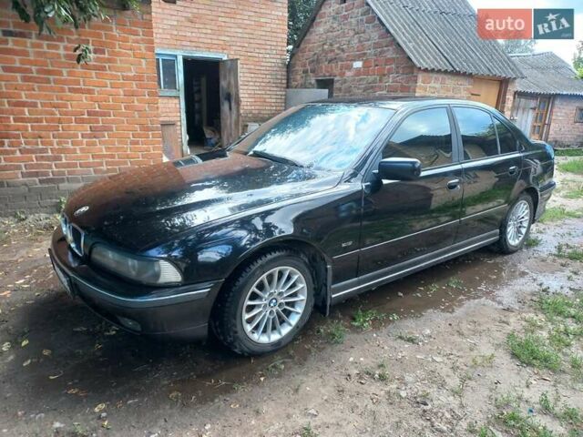 Черный БМВ 5 Серия, объемом двигателя 3.98 л и пробегом 322 тыс. км за 2800 $, фото 1 на Automoto.ua
