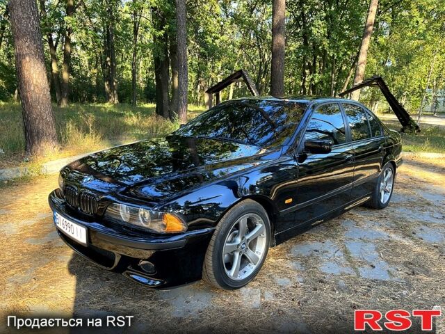 Черный БМВ 5 Серия, объемом двигателя 2.5 л и пробегом 350 тыс. км за 4500 $, фото 1 на Automoto.ua