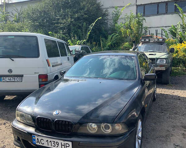 Черный БМВ 5 Серия, объемом двигателя 2.5 л и пробегом 305 тыс. км за 4500 $, фото 1 на Automoto.ua